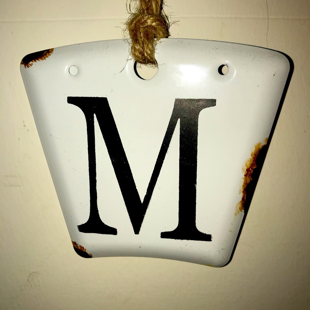 Distressed “M”